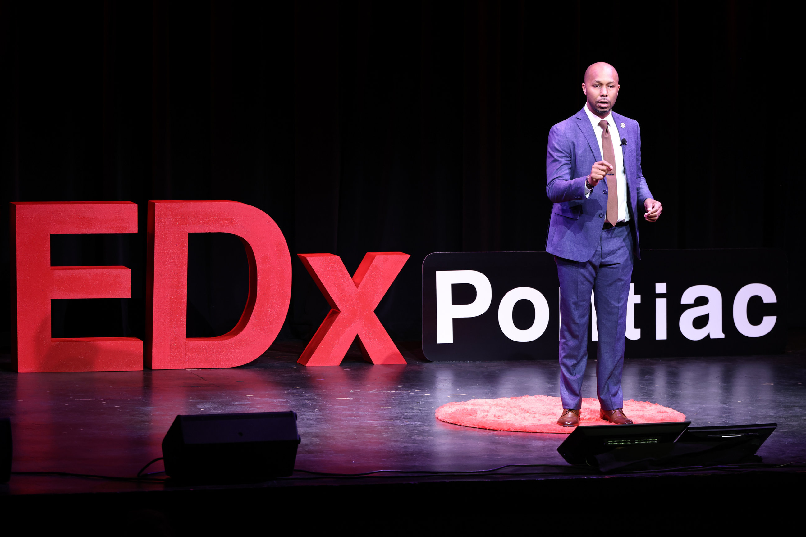 Marc D. Alexander delivering his TEDx talk at TEDxPontiac 2026